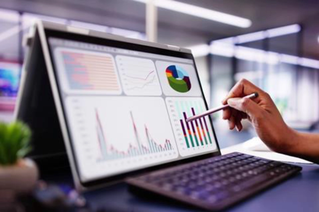 Person using a pointer to highlight a section of report on screen | Mobius